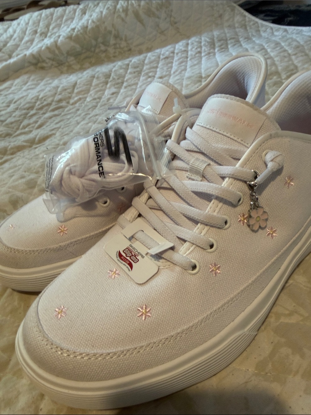 Vans Women’s Canvas Lace-Up Sneakers in Pale Pink with Daisy Charm